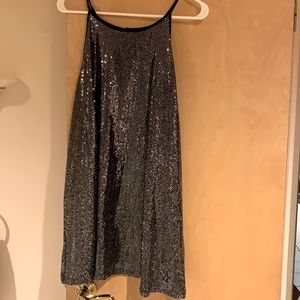 Dressy black and glitter sleeveless top.